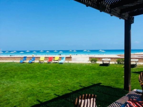Blissful Beach Front 4 Bedroom Villa